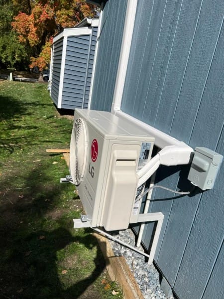 LG brand outdoor ductless mini split unit in Elkridge MD cabin